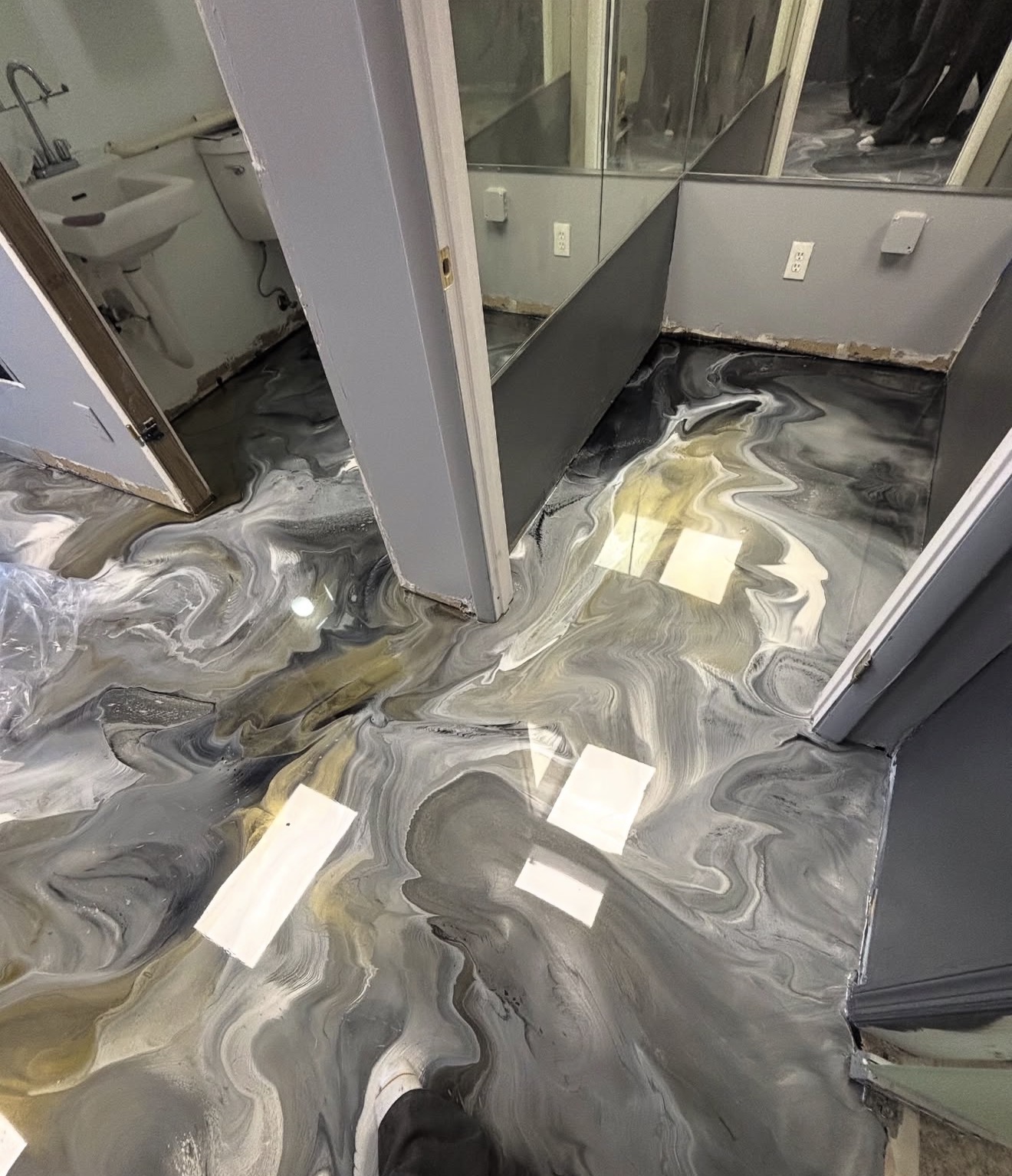 Silver and gold metallic flake bathroom floor